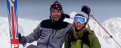 Man and woman skiing in the best of Japan's snow